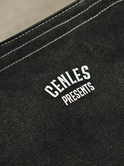 カラーブロックキャンバスハンドバッグの精密な縫製と高品質キャンバス素材のクローズアップ。摩耗に強く時間と共に風合いが増すデザイン。