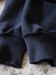 製品画像: アメカジヴィンテージパッチワークプルオーバースウェットの正面画像。ヴィンテージ感とパッチワークデザインが際立つ
詳細画像: パッチワークデザインのディテールが強調されたスウェットのクローズアップ画像