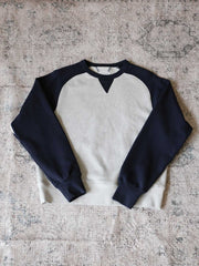 製品画像: アメカジヴィンテージパッチワークプルオーバースウェットの正面画像。ヴィンテージ感とパッチワークデザインが際立つ
詳細画像: パッチワークデザインのディテールが強調されたスウェットのクローズアップ画像