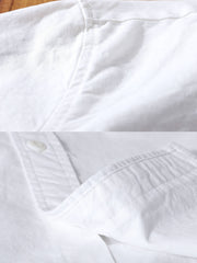 製品画像: クラシックホワイトオックスフォード長袖シャツ全体展示 詳細画像: シャツのディテールと生地の質感をクローズアップ