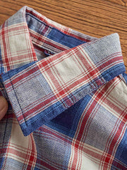 チェック柄のカッティングディテールとウォッシュド加工された生地の質感