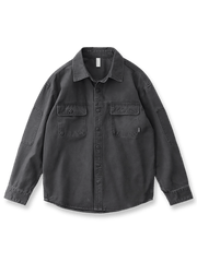 製品画像: ヴィンテージ風ワークシャツの正面全体展示、ワイドシルエットとクラシックなデザインを強調。