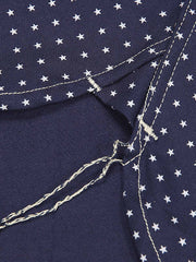 詳細画像: スター抜染パターンとレトロな六角形キャッツアイボタンのディテール