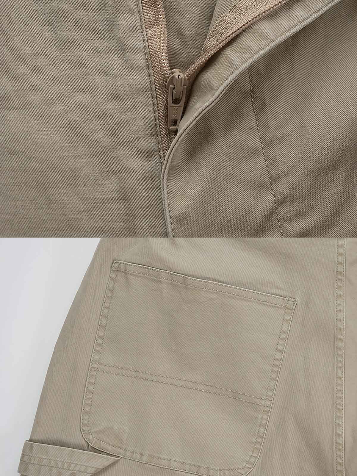 ウォッシュド多ポケットカーゴハーフパンツの細部図、高品質のYKKジッパーと高密度ツイル生地を示す
