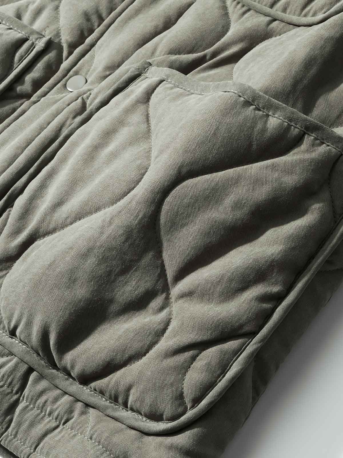 製品画像: ヴィンテージ風ひょうたん型キルティング中綿ジャケットのフロントビュー
詳細画像: ひょうたん型キルティング模様のディテール特写