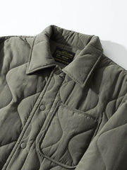 製品画像: ヴィンテージ風ひょうたん型キルティング中綿ジャケットのフロントビュー
詳細画像: ひょうたん型キルティング模様のディテール特写