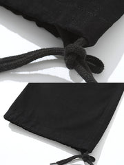 ワークパンツの多ポケットとドローストリングデザインのディテール