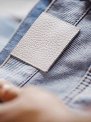 ウォッシュドブルーフリンジデニムパンツ