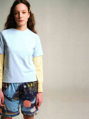 モデルが着用するアクションペインティング速乾メッシュパジャマショーツの展示画像