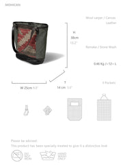 製品画像: インディアンラグヴィンテージキャンバストートバッグの正面画像。キャンバスとレザーを組み合わせた12Lの大容量設計。
詳細画像: ヴィンテージトートバッグのレザーとウールラグのコンビネーションディテール画像。独特のデザインが特徴的な素材の組み合わせ。