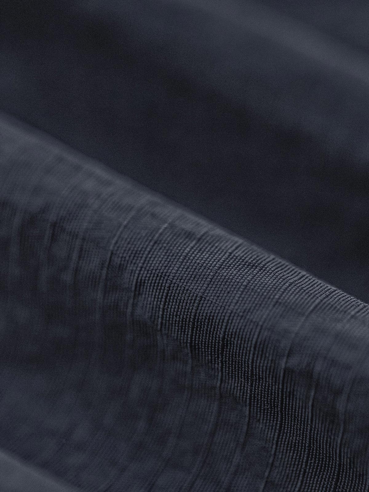 ショーツの多ポケットとドローコードエンドのディテール図