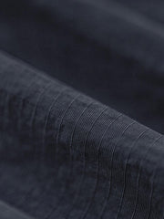 ショーツの多ポケットとドローコードエンドのディテール図