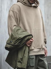 裾ボタンデザイン フード付きスウェット