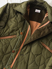 ジャケットのディテール。3Mシンサレート™の中綿と精巧な作りを示す。