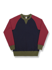 レトロなカラーブロックとラグランスリーブが特徴の厚手クルーネックスウェット