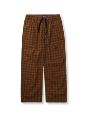 千鳥格子柄とレトロゴムウエストを配したスラックスパンツ。