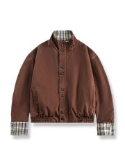 表裏で楽しめるチェック柄とカフェカラーのリバーシブルジャケット。