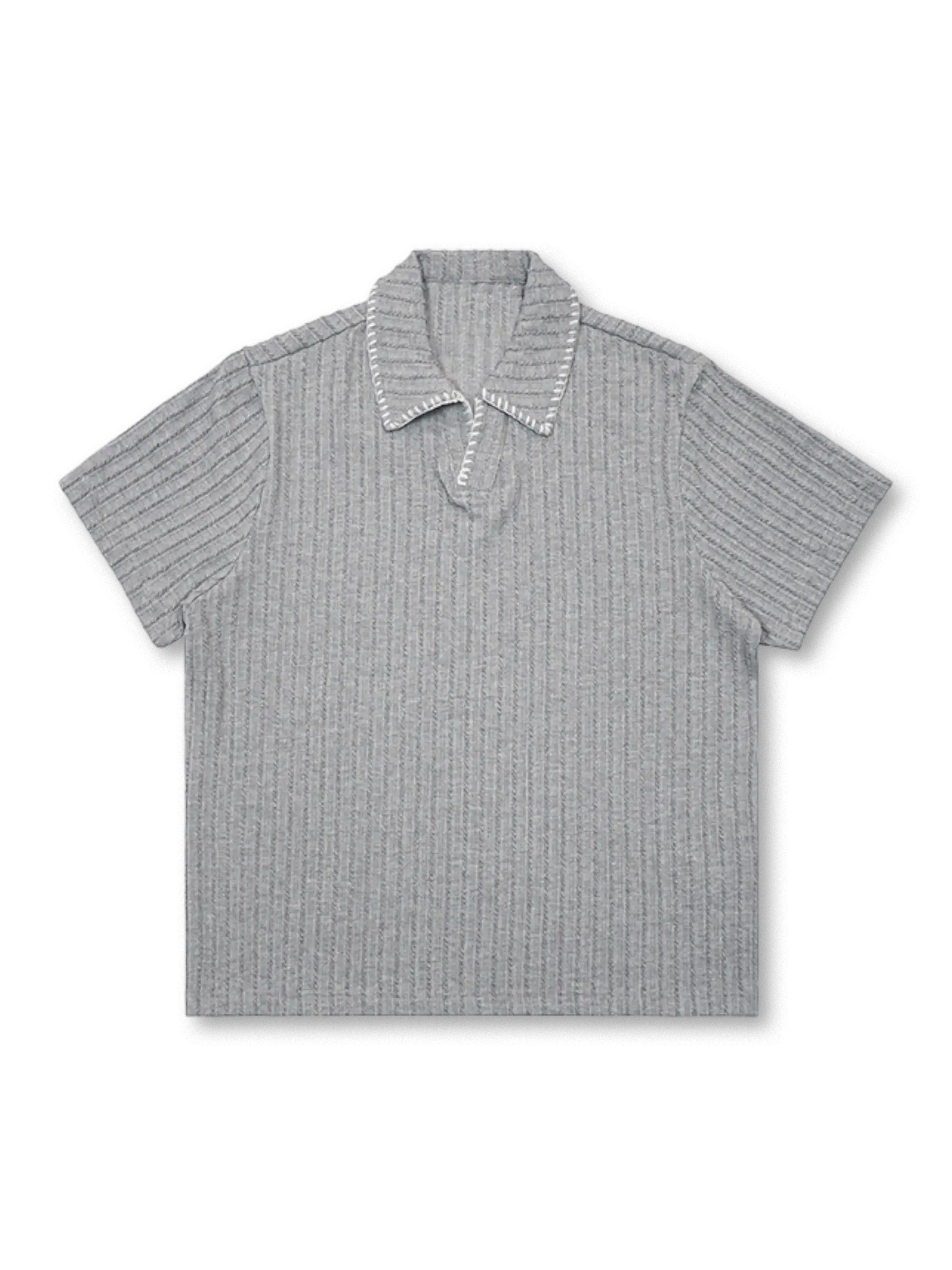 麦穂柄リブ編みとレーストリムが際立つニットポロシャツ