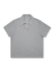 麦穂柄リブ編みとレーストリムが際立つニットポロシャツ