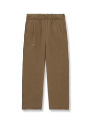 スプラッシュペイントプリントのスウェットスラックスの製品イメージ