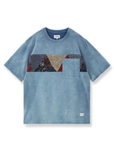 ろうけつ染めと古布パッチワークを施したウォッシュ加工Tシャツ。