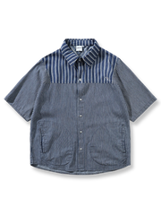 ストライプのパッチワークと刺繍が特徴の薄手コットンデニム半袖シャツ。
