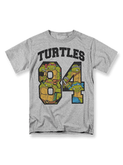 『ミュータント・タートルズ』カートゥーン印花Tシャツの正面画像。クラシックなミュータント・タートルズと「Turtles 84」のスローガン