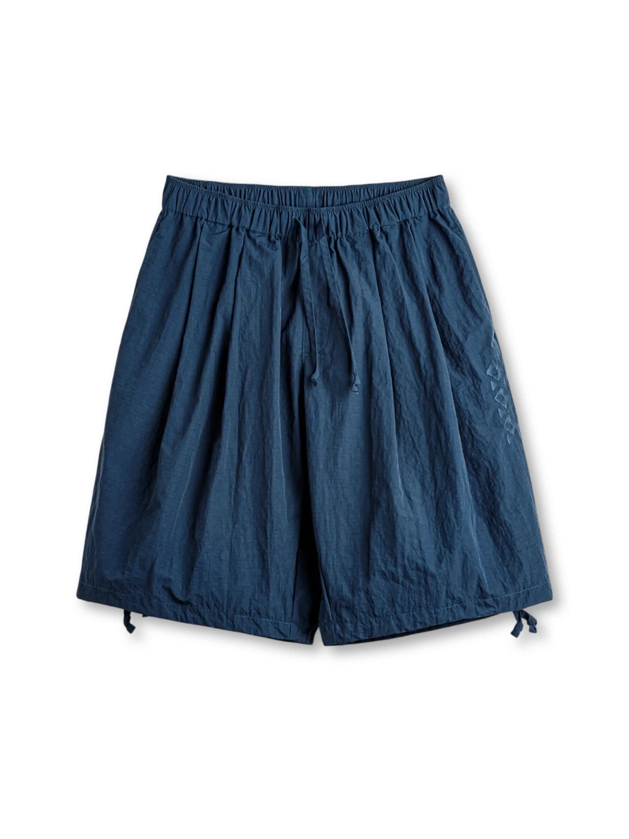 ナバホ刺繍が映える深海ブルーのドローストリングショーツ