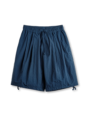 ナバホ刺繍が映える深海ブルーのドローストリングショーツ