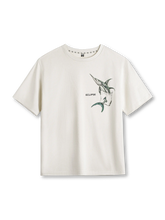 錯視風マーリンプリントが特徴のトライバルモチーフ白Tシャツ