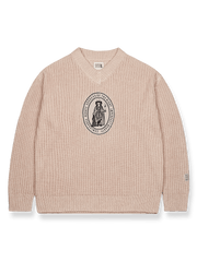 製品画像: レトロなウールVネックニットセーターの全体展示