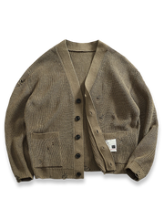 ヴィンテージ風のダメージ加工が魅力のVネックカーディガンセーター