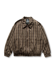 レトロチェック柄とゴム裾が特徴のカバーオールジャケット。ワーク感と快適な着心地を兼ね備えています