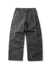 サンドウォッシュ加工とカットオフポケットが特徴のヴィンテージ風パンツ