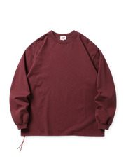 320gヘビーコットン素材を使用し、ヴィンテージウォッシュ加工が施されたルーズシルエットのロングスリーブTシャツ。