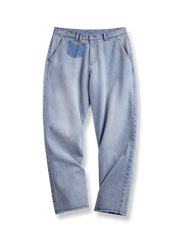 ウォッシュドブルーフリンジデニムパンツ。