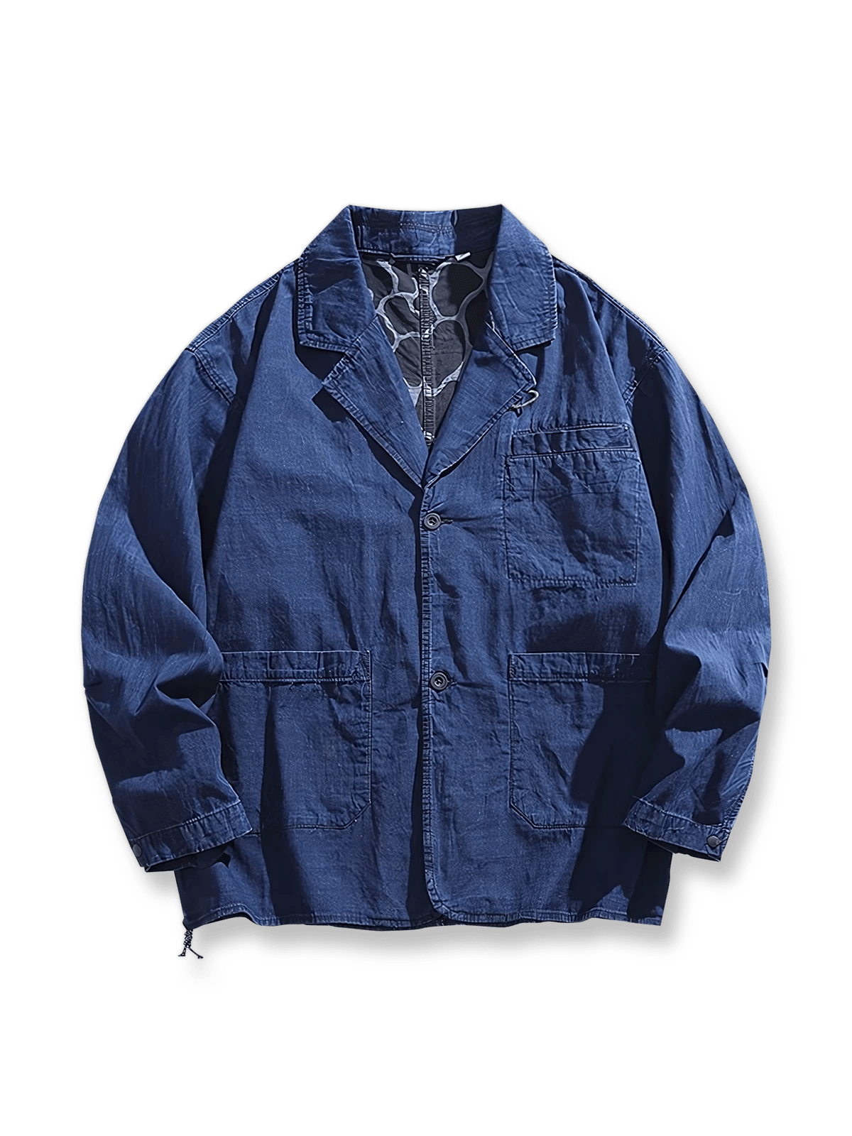 ルーズフィットと波模様プリントが特徴のウォッシュデニムブレザー。