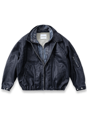 ウォッシュ加工PUレザーとエスニック柄裏地が特徴のダブルレイヤード風ジャケット。