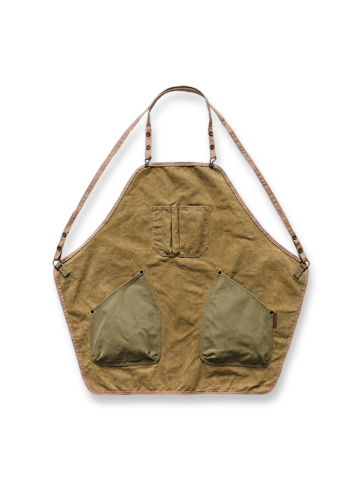 ウォッシュ加工を施したキャンバス素材のヴィンテージ風パッチワークエプロン。胸部と下部にポケットを備えたユニセックスデザイン。