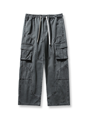 ウォッシュドヴィンテージマルチポケットワークパンツの全体正面画像、多機能ポケットとウエストドローストリングのディテール。