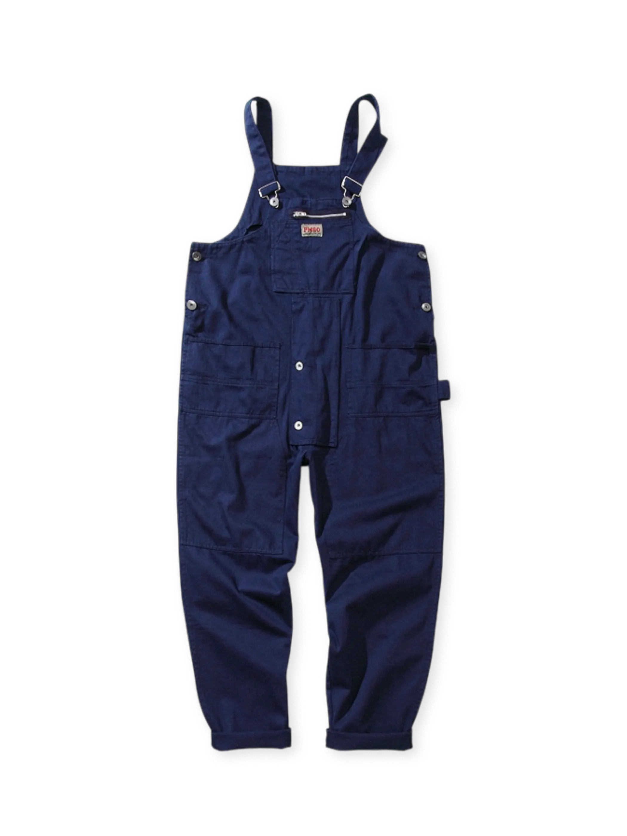 調節可能な肩ストラップと複数ポケットを備えた、ルーズシルエットのコットンサロペットオーバーオール。耐久性と実用性に優れる。