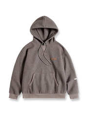 起毛加工が特徴のウール混フード付きパーカー。保温性と実用性を兼ね備えた冬の必須アイテム。