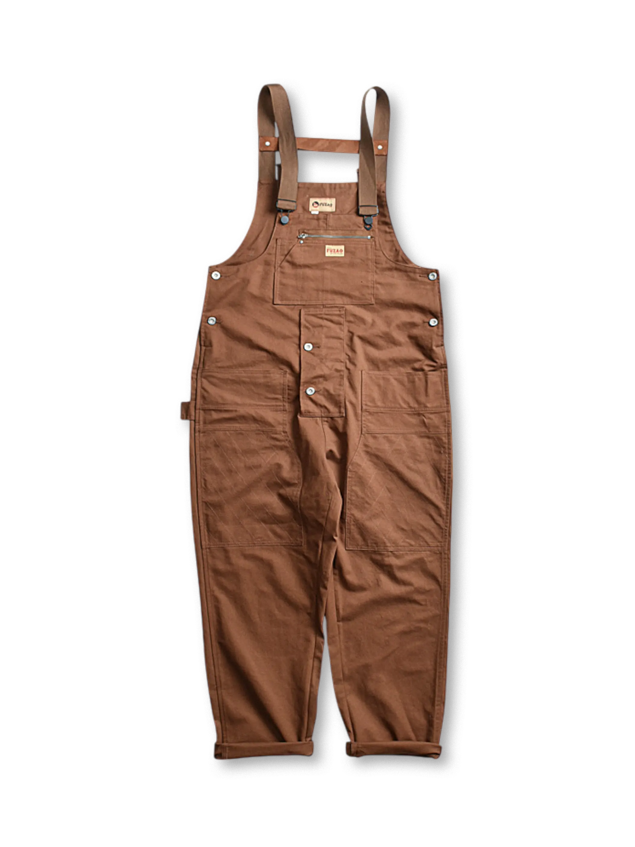 大きなポケットと調節可能なショルダーストラップが特徴のワークオーバーオール