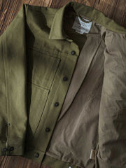 21oz帆布クルーザージャケットの全体展示、厚手の帆布素材とクラシックなワークウェアデザインを表現 詳細画像: ジャケットのディテールショット、帆布の質感と裏地のディテールを展示