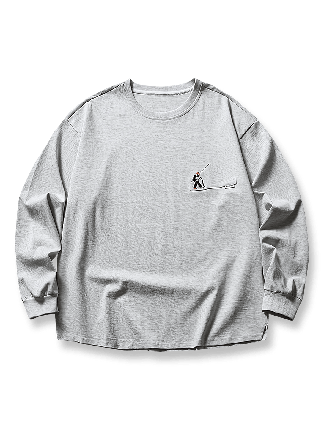 登山者刺繍が施された280gコットン長袖Tシャツ。ルーズフィットのクルーネックとヴィンテージアウトドアテイストを特徴とするアイテム。