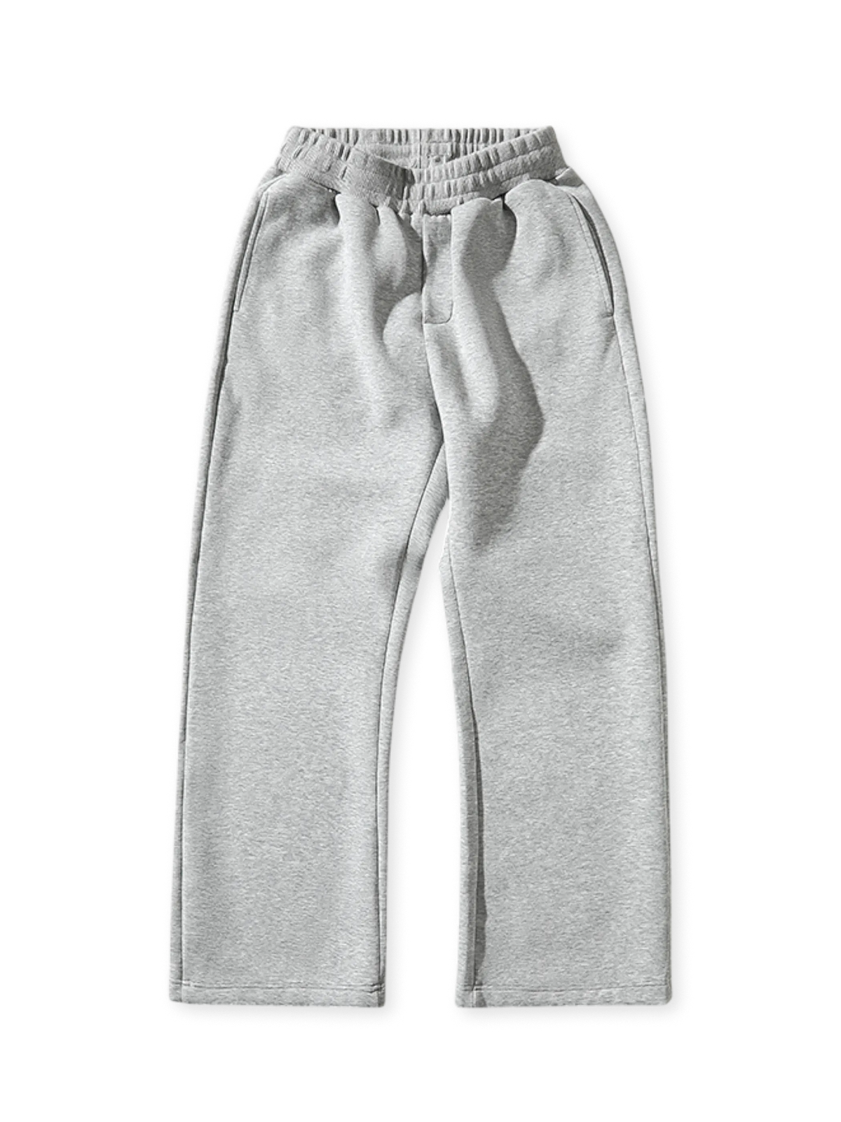 三層構造エアレイヤー生地の微フレアスウェットパンツ。ワイドリブウエスト、隠しポケット、バックダーツが特徴。