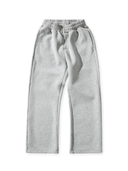 三層構造エアレイヤー生地の微フレアスウェットパンツ。ワイドリブウエスト、隠しポケット、バックダーツが特徴。