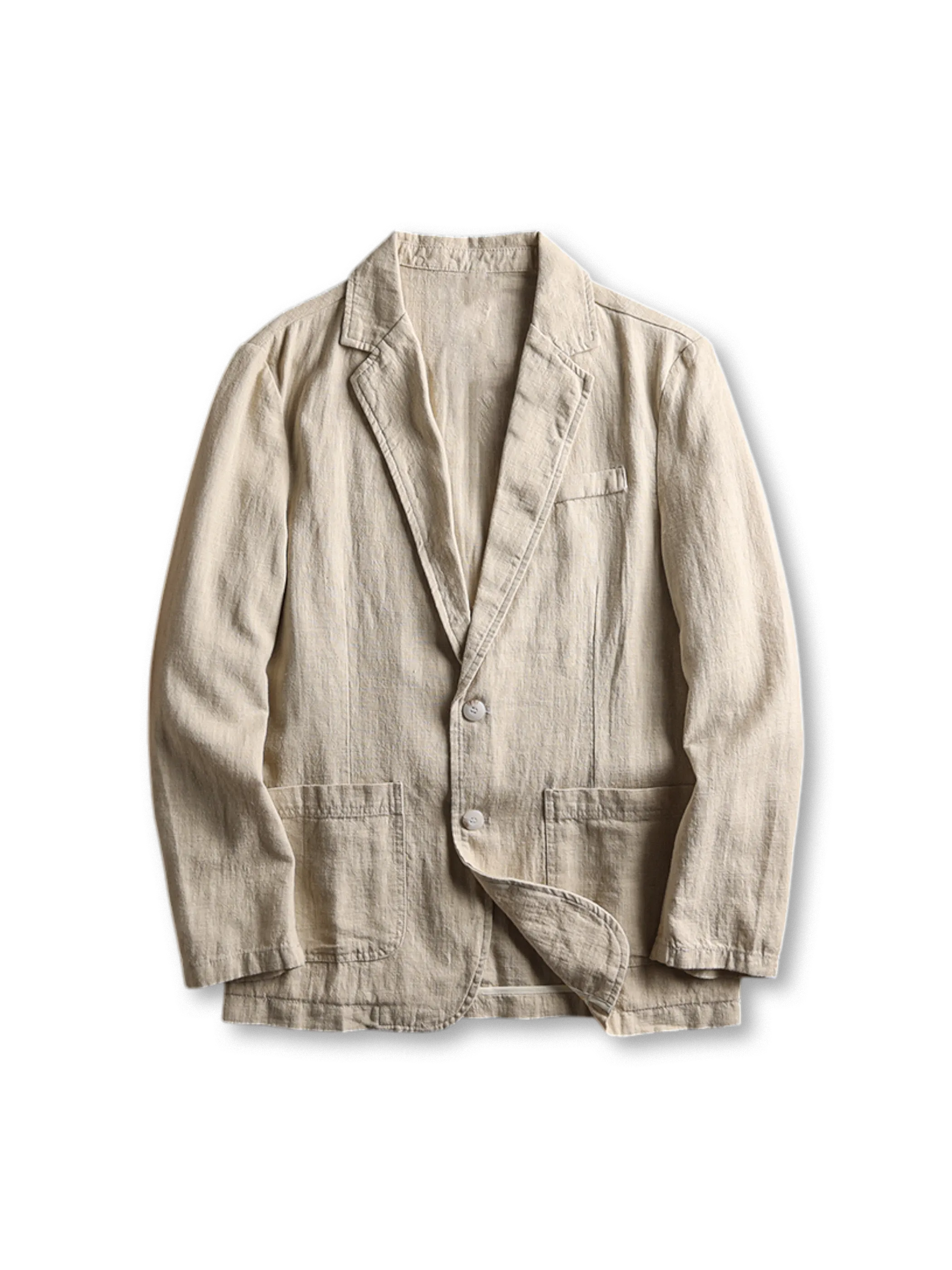 リネンブレンドのテーラードジャケット、フロントに二つボタンとパッチポケットが見える
