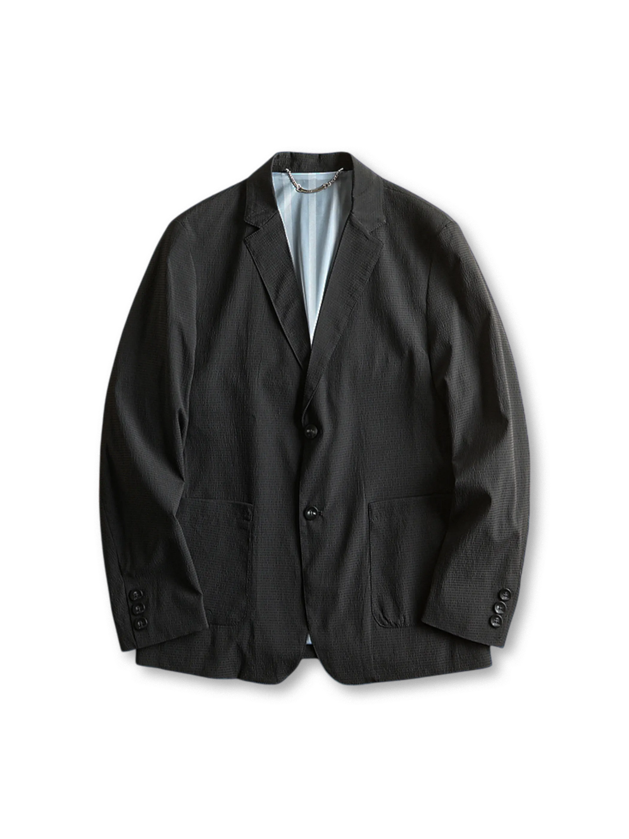 ネイビーの水波紋テクスチャーが特徴的なストレッチビジネスジャケット