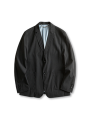 ネイビーの水波紋テクスチャーが特徴的なストレッチビジネスジャケット